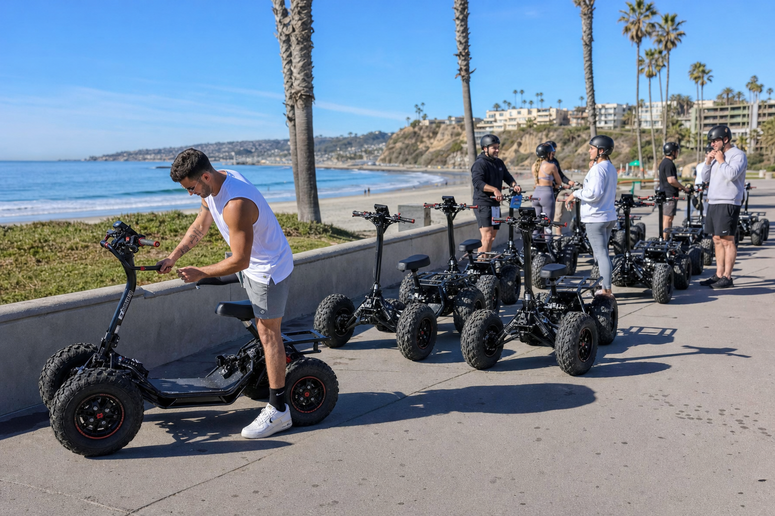Guided EZRaider-style tour fleet staged near a San Diego beach boardwalk